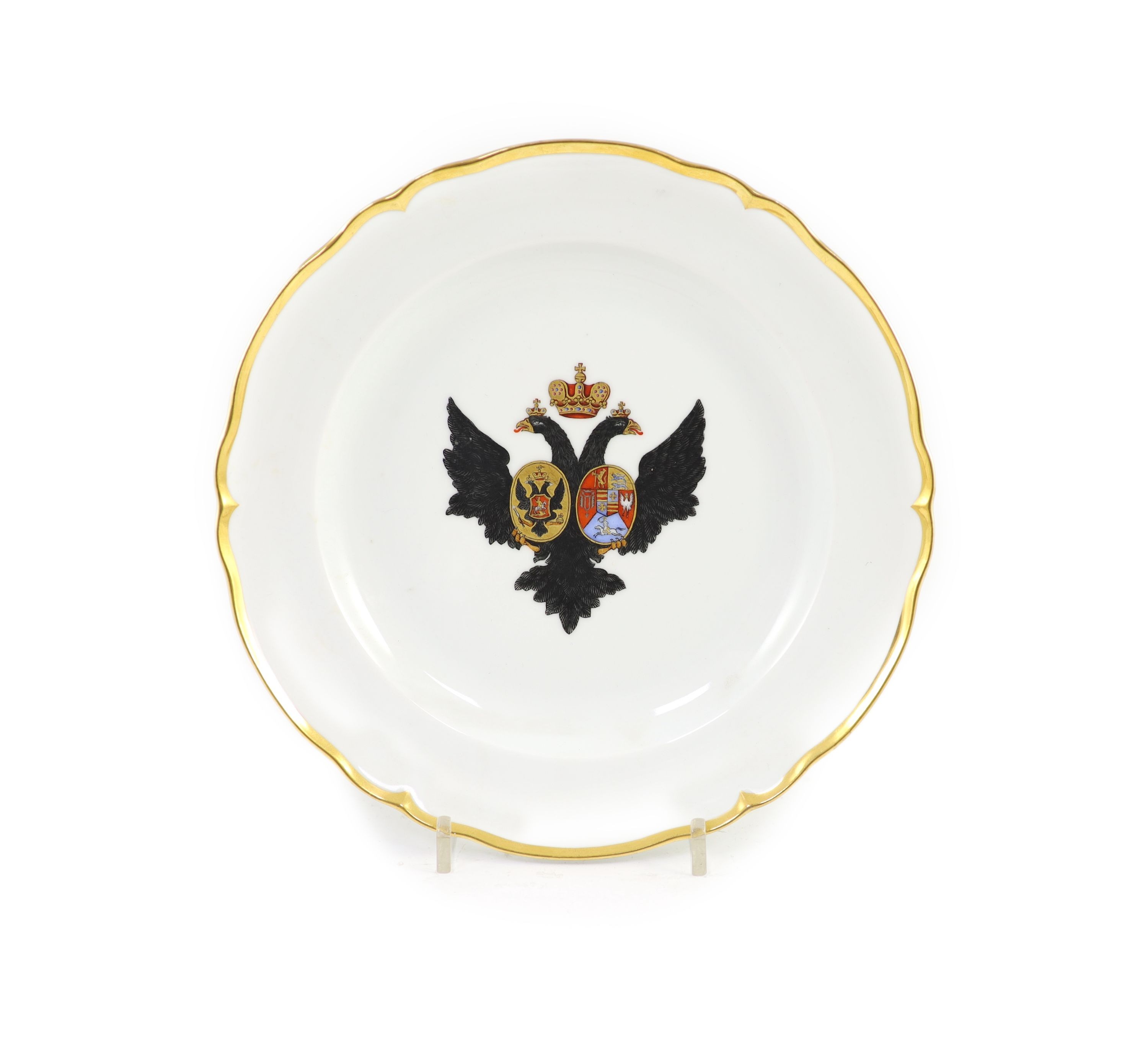 A Russian porcelain armorial plate, Imperial Porcelain Factory, St. Petersburg, Period of Alexander II, (ruled 1856-81), 24.8 cm diameter